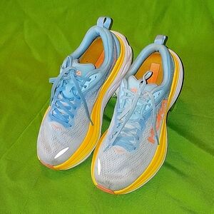 Size 8.5 slightly used light blue,yellow,and orange HOKA sneakers